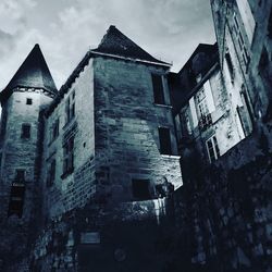 Low angle view of old building against sky