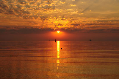 Scenic view of sunset over sea