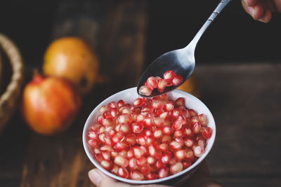 Close-up of pomegranate seed in bowl