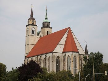 Low angle view of historic building against sky