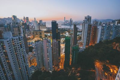 Aerial view of city lit up at night