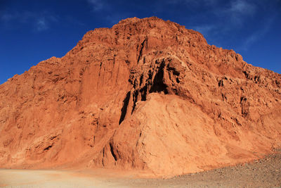 View of rock formations in desert against sky