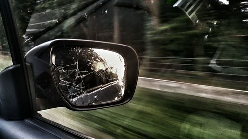 Reflection of car on glass window