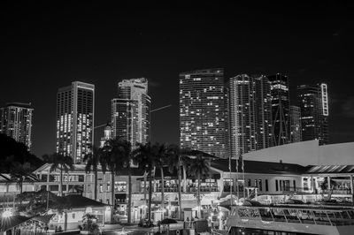 Illuminated buildings in city at night