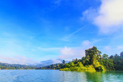 Scenic view of lake against blue sky