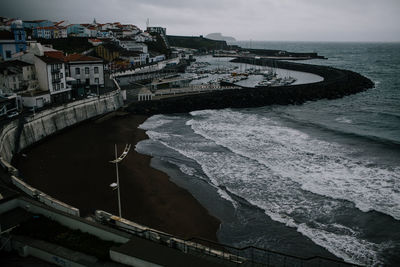 View of cityscape with sea in background