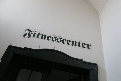 Low angle view of text on building