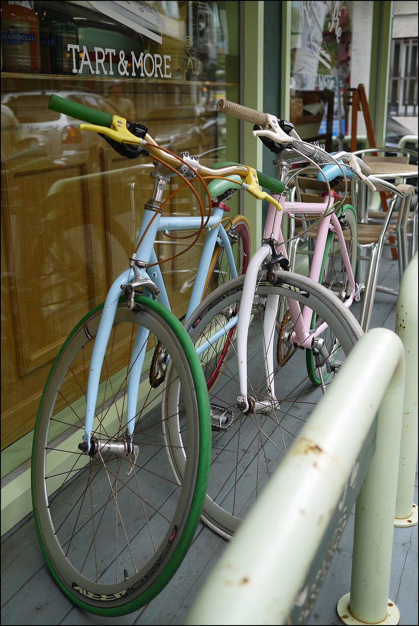 bicycle, mode of transport, transportation, architecture, built structure, land vehicle, stationary, building exterior, metal, indoors, day, no people, building, parking, parked, close-up, wall - building feature, city, pipe - tube