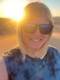 Portrait of a smiling young woman outdoors