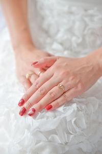 Closeup shot of the exchange of wedding or engagement ring
