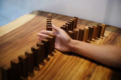 Midsection of person playing piano