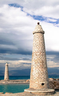 Monument against cloudy sky