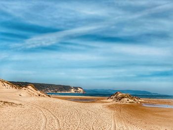 Scenic view of beach against sky