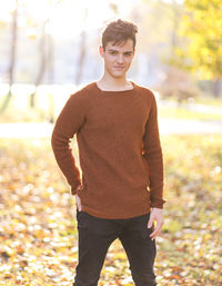 Portrait of young man standing outdoors during autumn