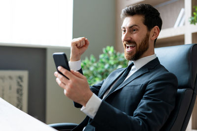 Young man using mobile phone