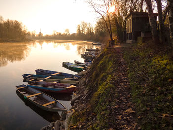 Scenic view of river at sunset