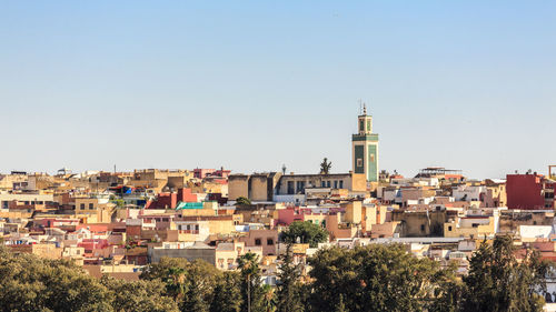 View of townscape against clear sky