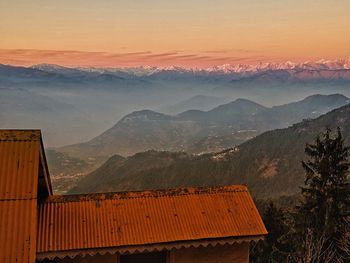 Scenic view of mountains against sky during sunset