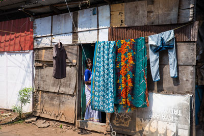 Clothes drying on wall against building