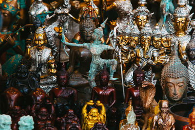 Close-up of statues for sale in store