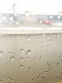 Close-up of water drops on glass