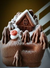 Close-up of hand holding ice cream cone