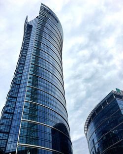 Low angle view of modern buildings against sky