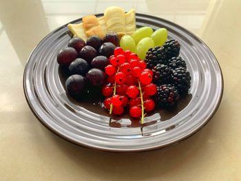 Close-up of fruits in plate