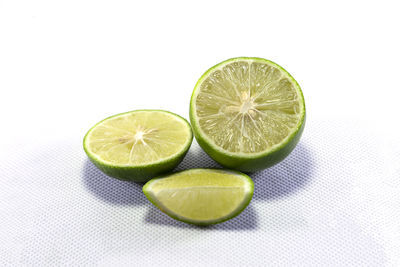 Close-up of fruits against white background