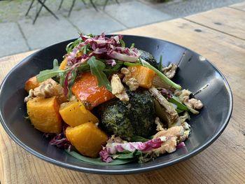 High angle view of fruits in plate on table
