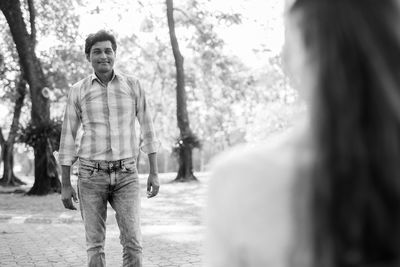 Portrait of young man standing outdoors