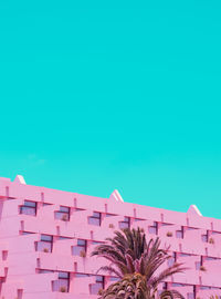 Minimalist building hotel and sky background. blue and pink colours trends. travel vacation concept. 