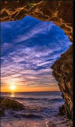 Scenic view of sea against sky at sunset