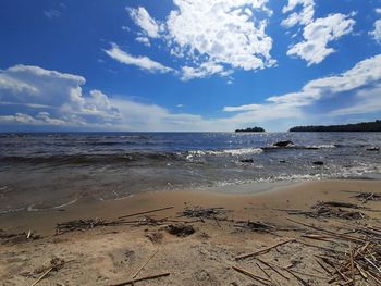 Scenic view of beach against sky