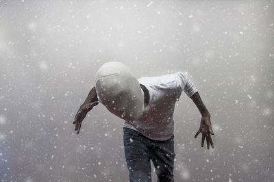 Man standing in snow