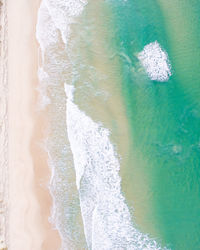 Aerial view of beach and waves 