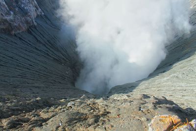 High angle view of smoke on rocky mountain