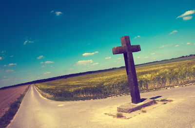 Cross against blue sky