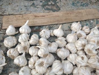 Close-up of white garlic for sale in market