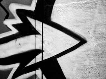 Close-up of shadow on tiled floor