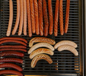 Directly above shot of sausages on barbecue