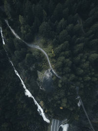 High angle view of waterfall amidst trees