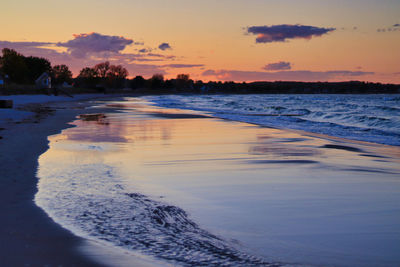 Scenic view of beach during sunset