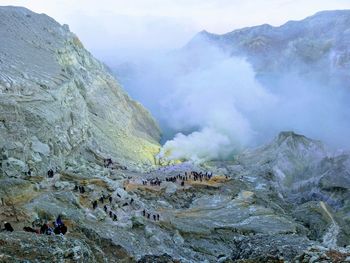 Smoke emitting from volcanic mountain