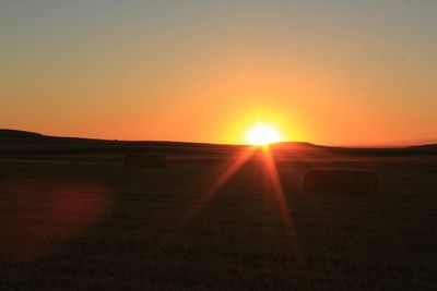 View of silhouette landscape at sunset