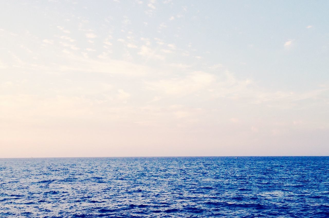 sea, waterfront, water, horizon over water, tranquil scene, scenics, tranquility, beauty in nature, sky, rippled, nature, seascape, idyllic, outdoors, no people, blue, remote, cloud, day, cloud - sky