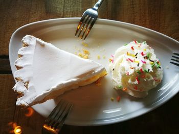 High angle view of cake in plate on table