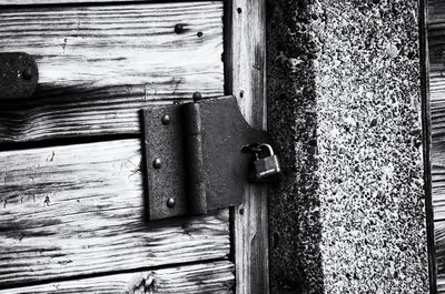 Close-up of padlock on door