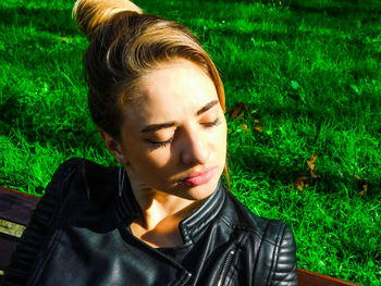 Close-up of young woman with eyes closed