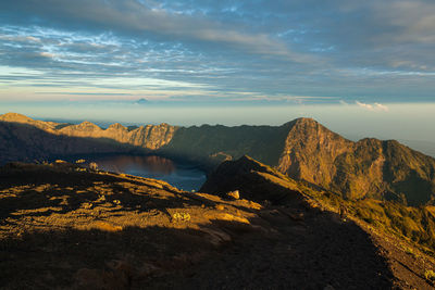 Scenic view of lake against sky during sunset